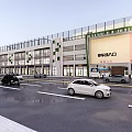 Modern Commercial Street With Glass Curtain Walls And Parking Entrance Area