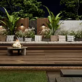 Stylish Outdoor Sofa With Cushions And Fire Pit On Wooden Deck With Green Plants