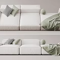 Modern White Three-Seater Sofa with Plaid Pillows Green Blanket and Decorative Ball