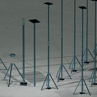 Sturdy Wrought Iron Poles With Triangular Stands Neatly Arranged On Outdoor Ground 3d model