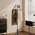 Modern Metal Coat Rack With Hanging Clothes And Multiple Hooks In Bedroom Interior