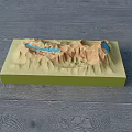 Commercial Equipment 3D Terrain Model With Green Base Brown Mountains And Blue Lakes