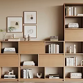 Wooden Bookshelf With Multi Tiered Beige Wall Decorative Paintings Books Small Decor And Vintage Radio