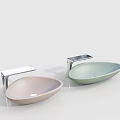 Two Oval Shaped Pastel Pink And Mint Green Washbasins With Metal Stands And Countertops