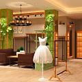 Modern Clothing Store Window Display With White Dress Mannequins Green Plant Wall And Wooden Shelves