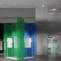 Modern Clothing Store Interior Design With Transparent Display Cases Blue Green Partitions And Hanging Clothes