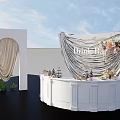 Elegant Floral Display for Drink Bar with Silver Drapery White Counter and Floral Arrangements