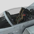 Gray Fighter Jet With Pilot In Cockpit Tail Number 708 Military Insignia And Underwing Payloads