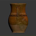 Carved Orange Earthenware Jug with Intricate Wave Patterns and Handle