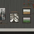 Stylish Wall Decor With Framed Artworks Shelf And Red Branches Accent