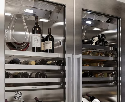 Stainless Steel Wine Cooler Interior With Wine Bottles And Glasses On Multiple Shelves 3d model