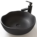 Black Textured Bowl Shaped Wash Basin with Modern Black Faucet Design