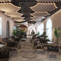 Cozy Café Interior Design With Arched Windows Decorative Lights Green Plants And Wooden Tables