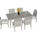 Modern Woven Dining Table And Chairs Set With Vase Flowers And Dinnerware 3d model