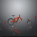 Red Bicycle With Disassembled Parts Including Wheels Seat And Frame On Reflective Surface