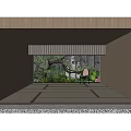 Indoor Courtyard Garden With Rock Stone Wall Lush Green Plants And Accent Chair