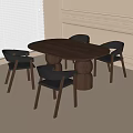Modern Oval Wooden Dining Table with Four Black Chairs and Round Bases in Minimalist Interior