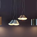 Contemporary Metal Pendant Lights With Various Shapes Illuminated On Dark Interior Background