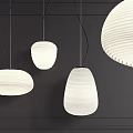 Modern White Pleated Chandeliers With Elegant Design Hung Against Dark Wall 3d model