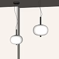 Modern Pendant Lights With White And Cream Round Shades And Black Stems On Wall