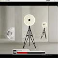 Modern Minimalist Floor Lamp with Circular Shade Tripod Stand and Moon Decor in Interior