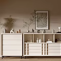 Modern White Console Cabinet And Sideboard With Vases Green Plants Decorative Painting On Light Brown Wall