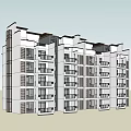 Modern Multi Story Residential Building With White Exterior And Large Windows
