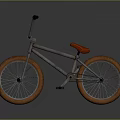 Sturdy BMX Bicycle With Red Seat Orange Tires And Metallic Frame
