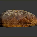 Freshly Baked Round Brown Bread With Sesame Seeds And Flour Dusting