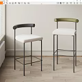 Modern Bar Stools With Curved Black And Green Backrests White Upholstered Seats And Metal Frames