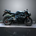 Black Sporty Motorcycle With Racing Design On Platform Against Gray Background