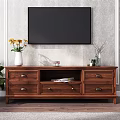 Wooden TV Stand With Yellow Flower Vase Candle And Dry Branches On Top