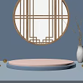 Chinese Style Decorative Display With Circular Window Lattice Blue Background Pink Platform And White Vase