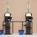Modern Commercial Self Service Checkout Machines With Digital Screens And Blue Shopping Baskets