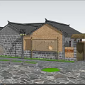 Traditional Chinese Courtyard Entrance Gate With Wooden Doors Stone Walls And Green Plants