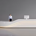 Modern Front Desk Reception With Curved White Desk Female Receptionist And Computer Monitor