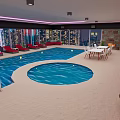 Cartoon Indoor Swimming Pool Scene With Blue Water Red Lounge Chairs And City Night View