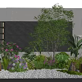 Beautiful Garden Decor With Small Tree Colorful Flowers Greenery And Pebble Ground