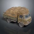 Vintage Green Utility Truck Loaded With Hay For Rural Transportation