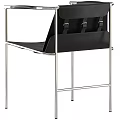 Black Leisure Chair With Sleek Metal Frame And Modern Design