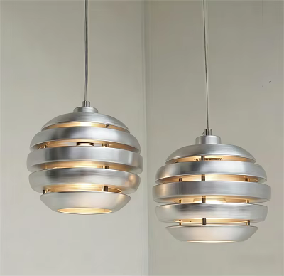 Two Modern Silver Layered Pendant Lights with Circular Design and Warm Glow 3d model