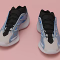 White And Black Sports Shoes With Blue Accents Streamlined Design And Breathable Mesh
