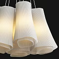 Elegant Modern Chandeliers with Pleated White Shades Illuminated in Contemporary Hanging Design