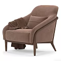 Brown Velvet Lounge Chair with Cushion Throw Blanket and Elegant Modern Design