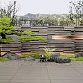 Modern Garden Wall Design With Stone Panels Pine Tree Greenery And Decorative Rocks