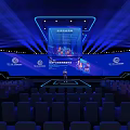 Modern Conference Stage Design With Blue Lighting Large Screens And Arranged Seats Setup