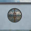 Traditional Chinese Garden Scene With White Wall Circular Window Pink Flowers And Stone Pavement