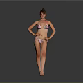 Confident Woman In Floral Bikini Standing With Hands On Hips Against Gray Background