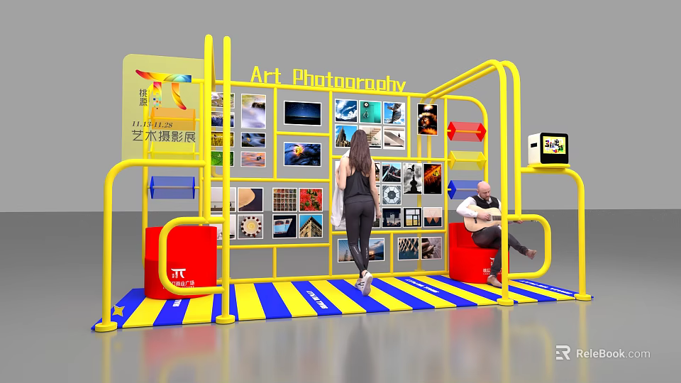 Art Photography Exhibition Booth With Yellow Frame Blue Yellow Striped Mat Displayed Photos And People 3d model 