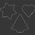 Delicate Metal Cookie Cutters with Star Heart Christmas Tree Shapes on Black Reflective Background